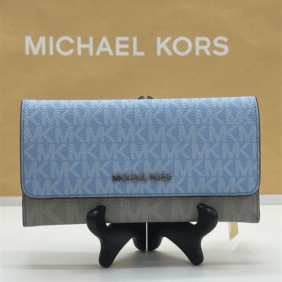 Michael Kors Jet Set Travel Signature Logo Tri-Fold Wallet
COLOR LT SKY MLT
NWT - Picture 1 of 16